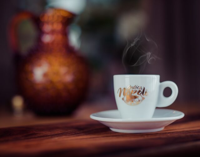 shallow focus photography of white ceramic teacup